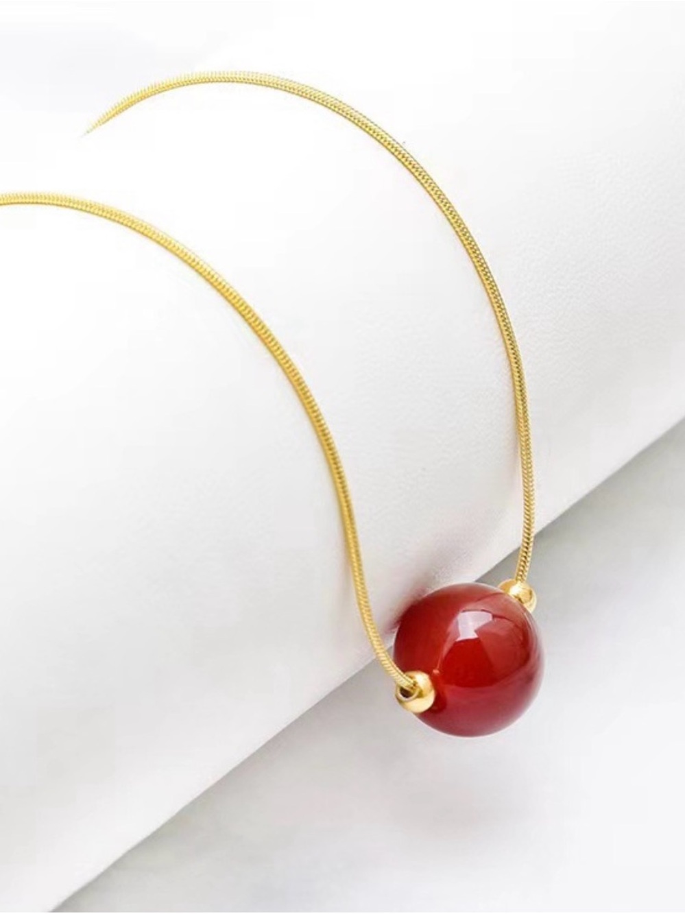 Gold Chain Necklace with Red Bead Pendant